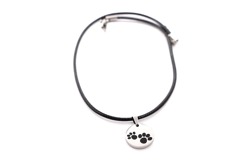 Set Pfotenanhänger + 1 Band