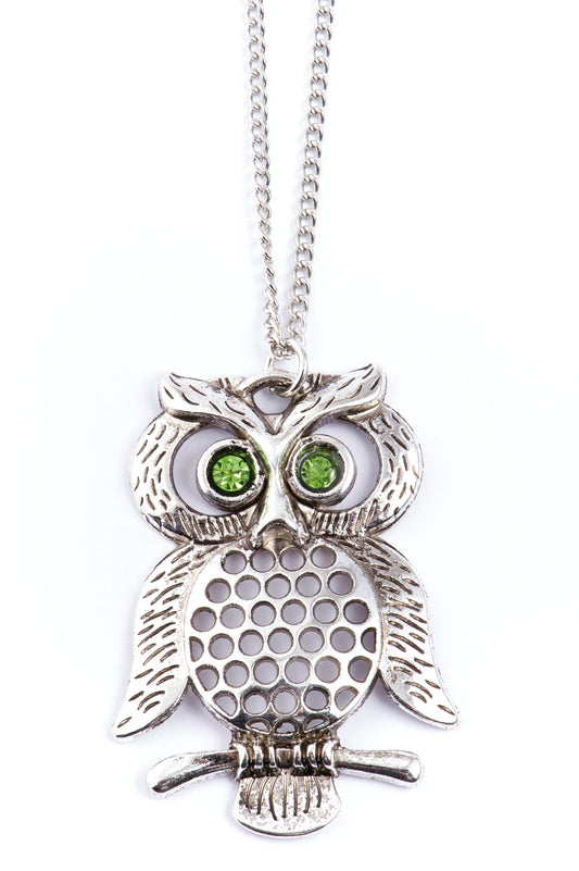 Eule mit grünen Augen